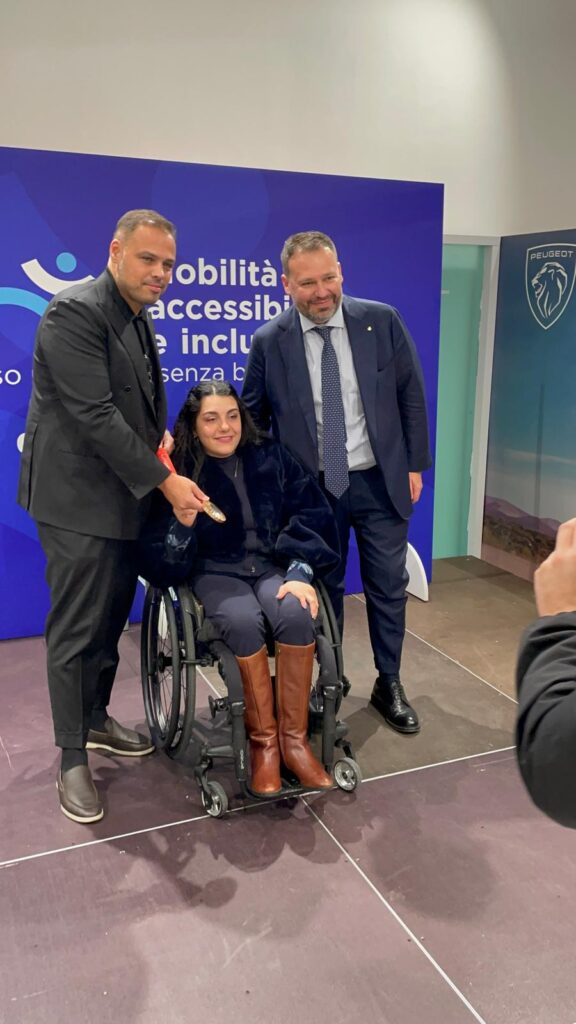 Ciro Veneruso (Autouno Group) e Guido Bourelly (Bourelly Group), con Angela Procida, campionessa paralimpica